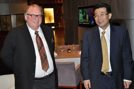 CPAFFC Vice President Jing Dunquan Having Joyful Chat with Minister Schumacher 